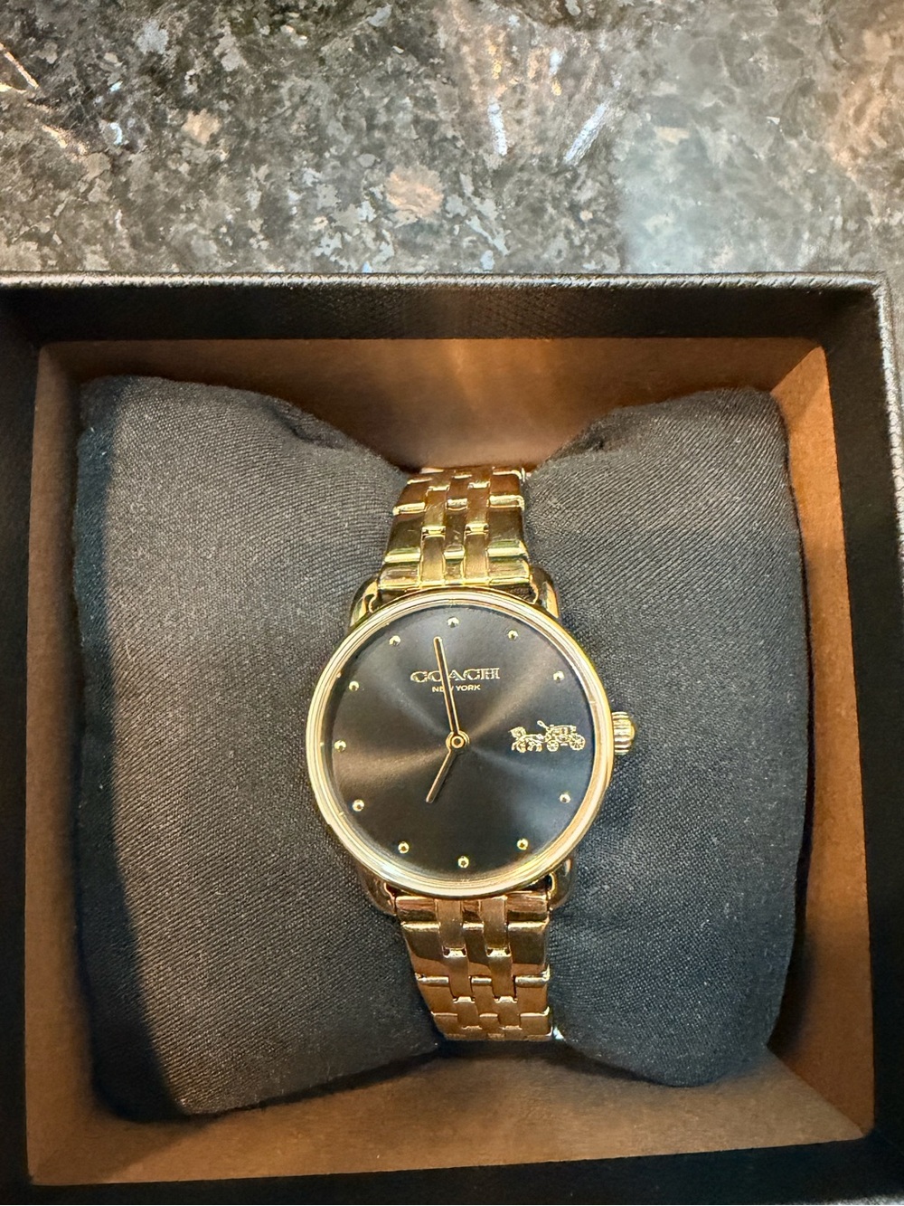 Coach women’s  Gold-Tone Black Dial watch